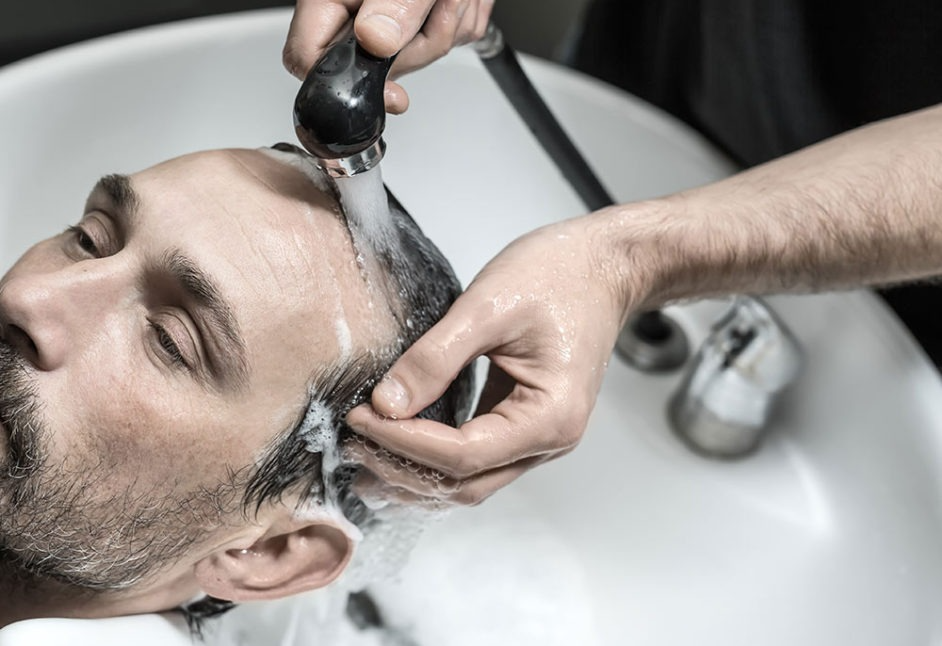 Barber Washing the Hairs of a Man